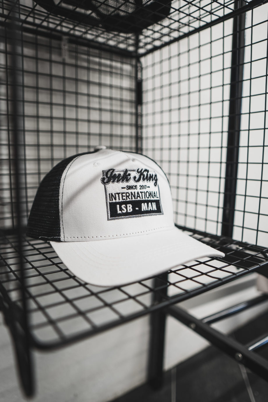 White Black International Trucker Hat