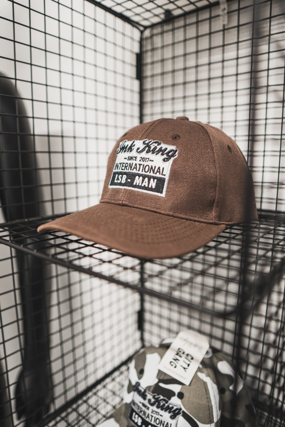 Brown International Strap Back Hat